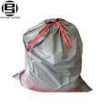 Black plastic garbage bags on roll with string